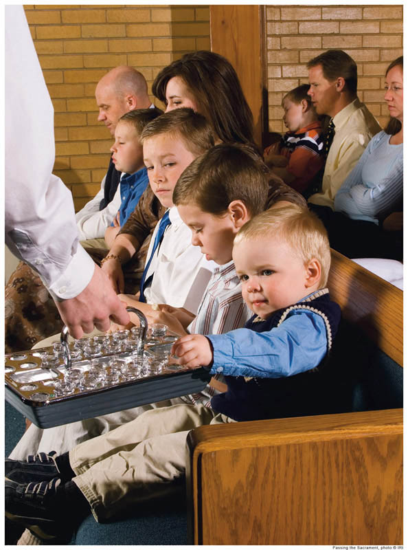 Passing the sacrament in a Mormon meeting.